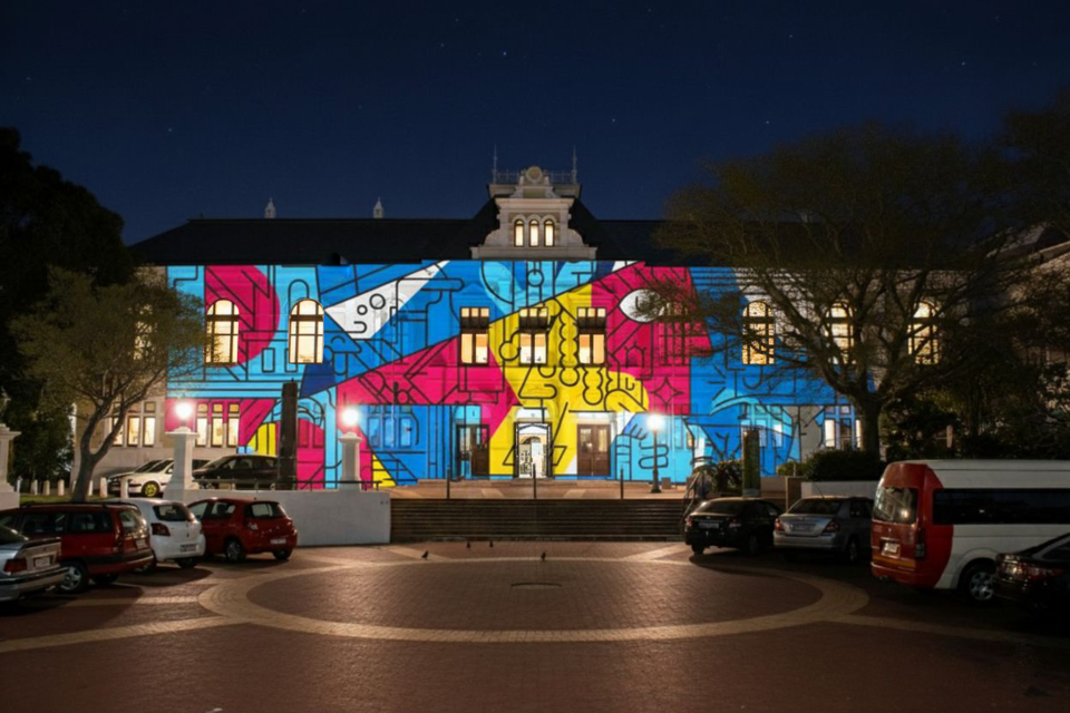 LUMENOCITY light festival projection mapping on historic building in Cape Town’s Company’s Garden at night