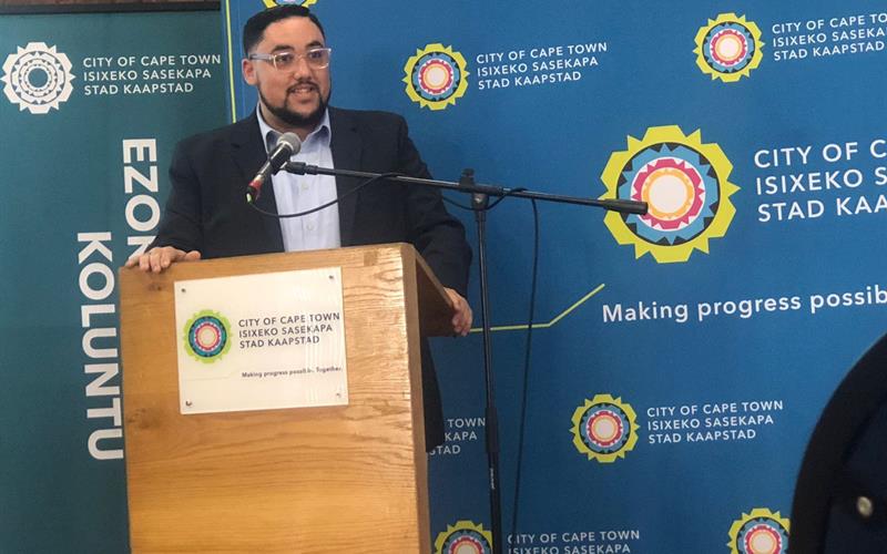 Cape Town official addressing affordable housing tender in Belhar