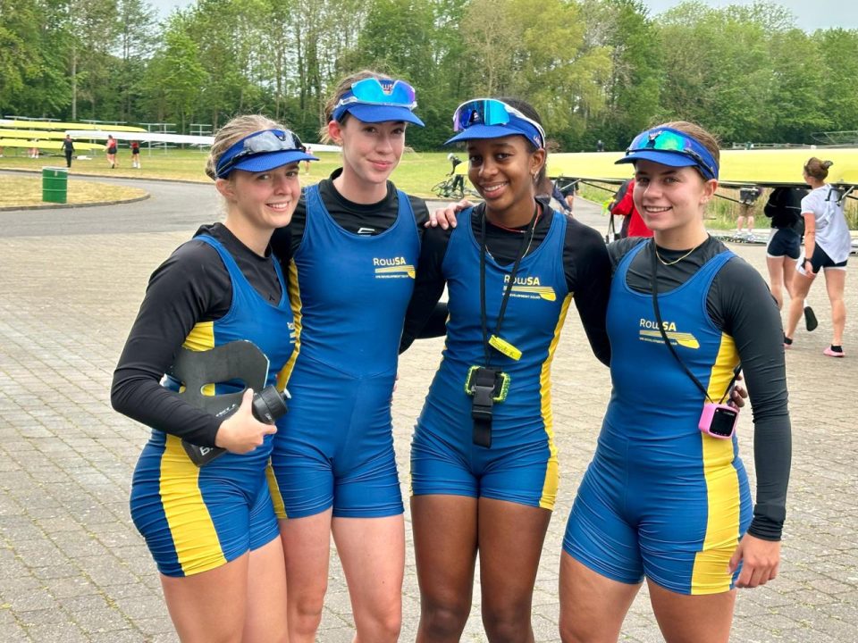 South African junior rowers posing during an international rowing competition in England.