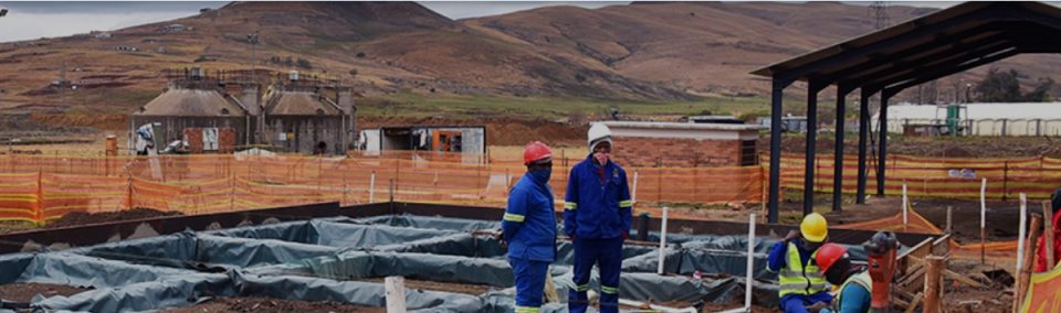 Water treatment and infrastructure facility surrounded by hills and natural landscape as part of a major bulk water supply project.