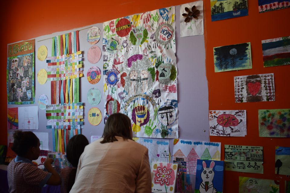 Young participants showcase artwork created through the Arts Aweh! after-school arts and culture programme.