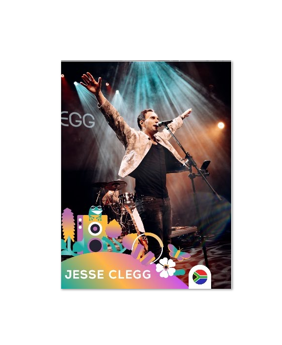 Jesse Clegg performs live on stage under colourful lights ahead of his headline performance at the Touching Dreams Gala Dinner fundraiser.