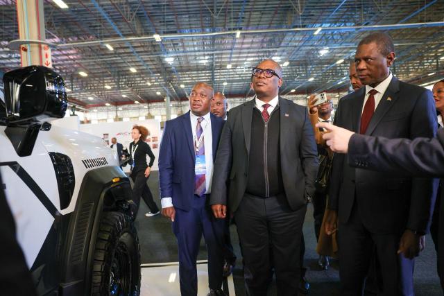 Deputy President Paul Mashatile and government representatives viewing a Chery vehicle during an automotive industry engagement.
