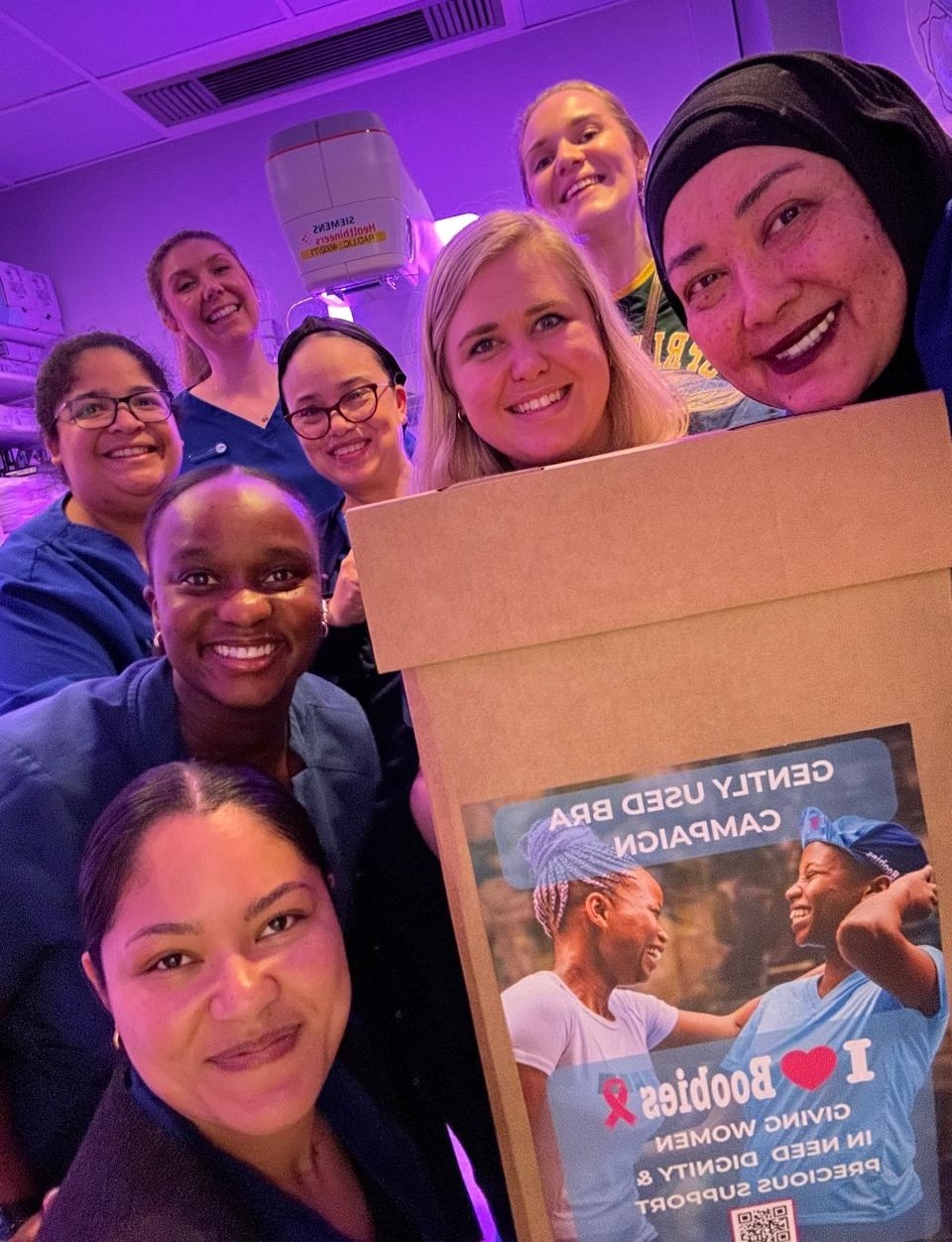 SCP Radiology mammography team members pictured with an ILoveBoobies Gently Used Bra Campaign collection box.