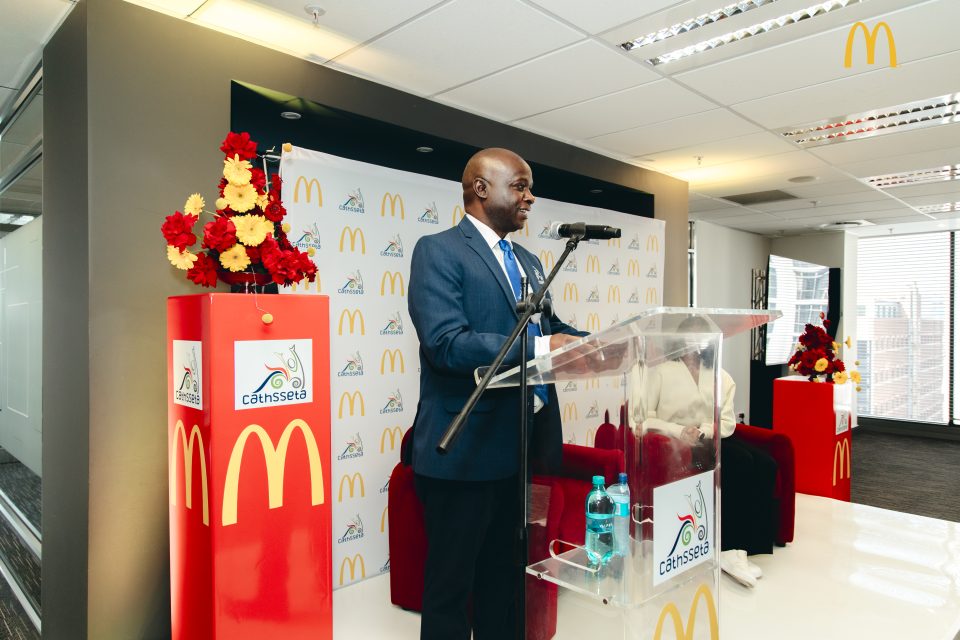 CATHSSETA representative addresses guests at the launch of an accredited youth skills and workplace training programme.