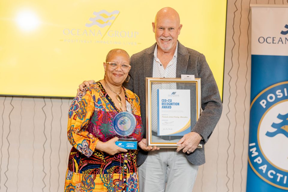 Two representatives from Oceana and the Peninsula School Feeding Association celebrate their long-standing school nutrition partnership.