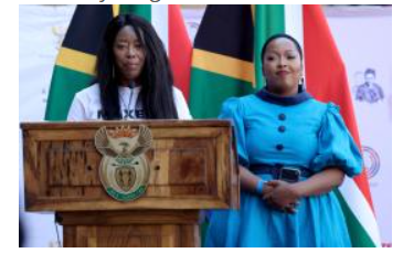 Two women at a podium during the International Portraits of Power event celebrating Charlotte Mannya Maxeke’s legacy.