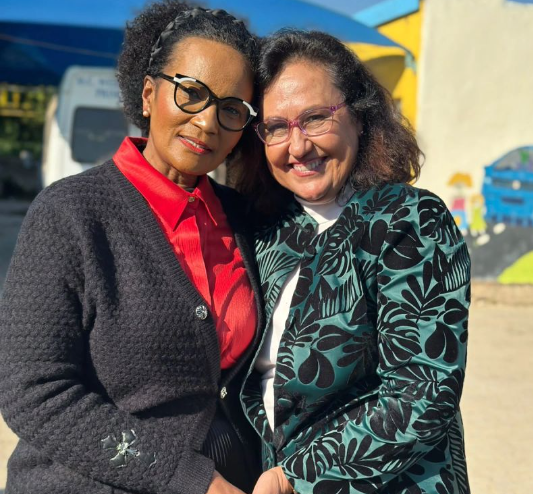 Two women attending the Empowering the Boychild workshop at M.C. Weiler Primary School in Alexandra.