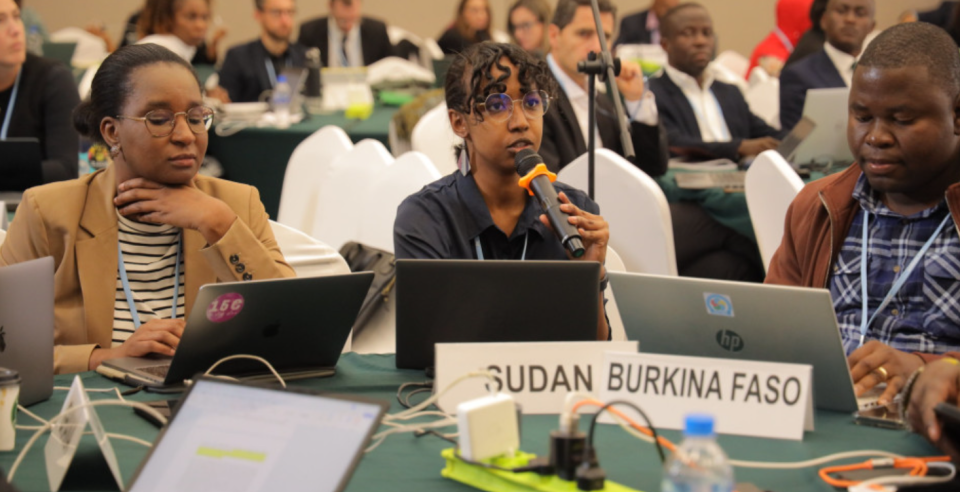 Climate and government representatives participating in an international climate technology forum.