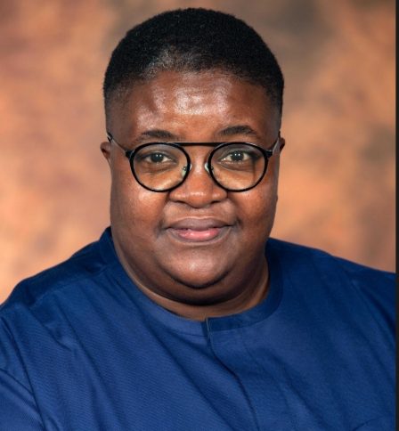 Portrait of Deputy Minister Mmapaseka Steve Letsike wearing a blue outfit.