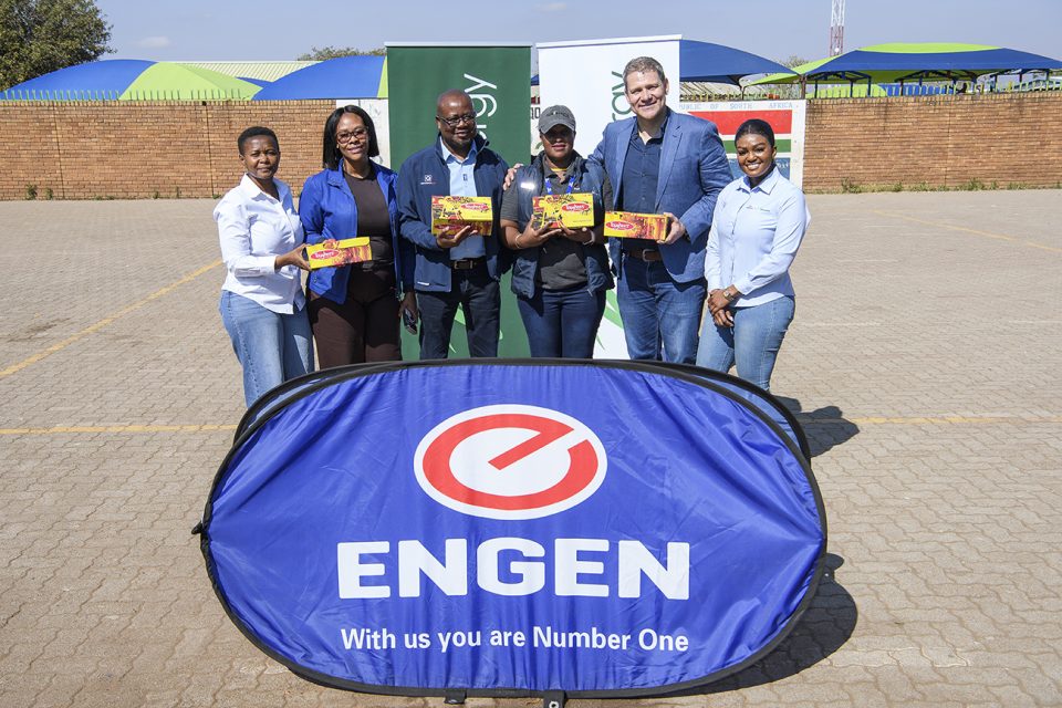 Engen representatives and community partners at the school shoe handover supporting learners at Siqobile Primary School in Tshwane.