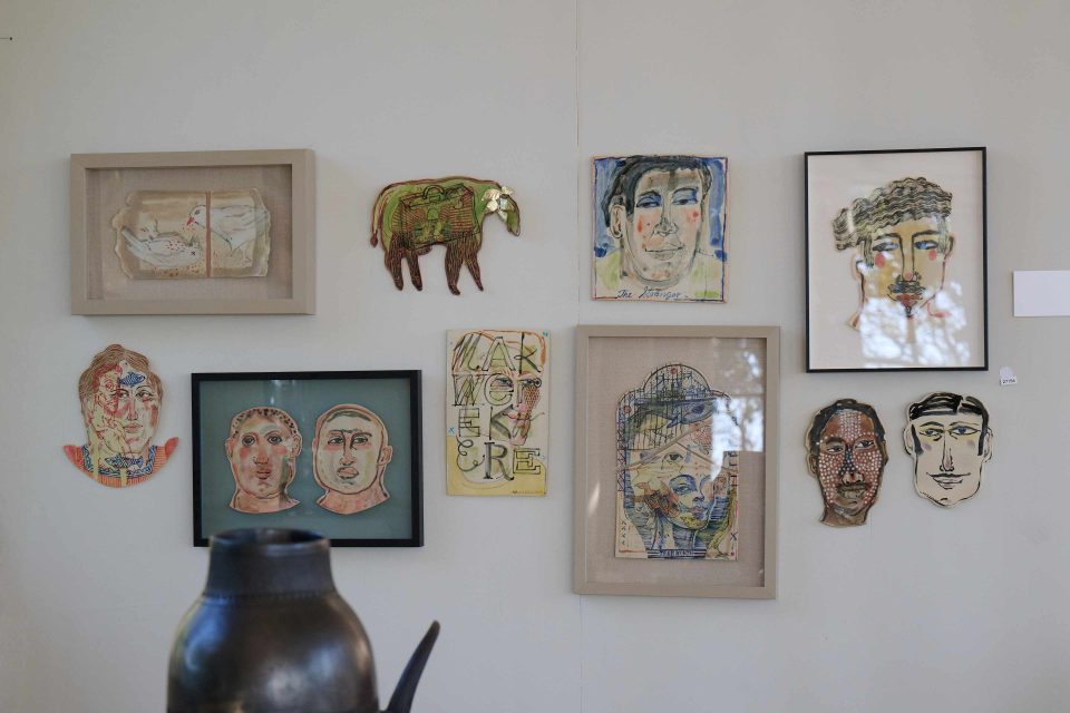 Ceramic artworks featuring expressive faces and sculptural forms displayed at the Ceramics Southern Africa Gauteng Regional Exhibition.