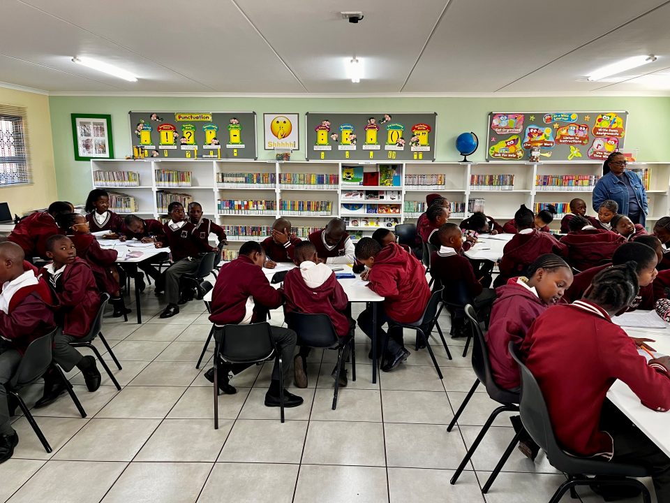 Learners at Morojaneng Primary School participate in reading and literacy activities inside the library created through the Tubs2Classrooms project.