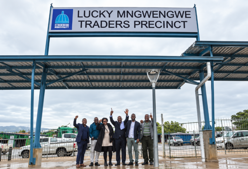 Representatives celebrate the opening of the Lucky Mngwengwe Traders’ Precinct in Hammarsdale, providing upgraded trading spaces for local informal businesses.