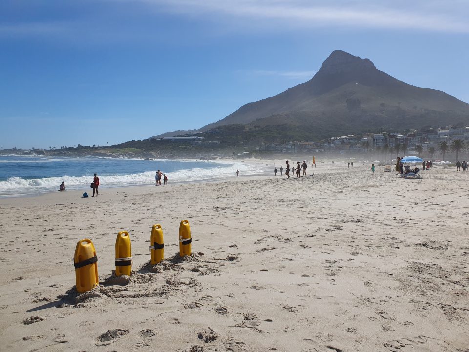Camps Bay Beach in Cape Town, one of the City’s eight Blue Flag beaches for the 2026/27 season, with the Twelve Apostles mountain backdrop.