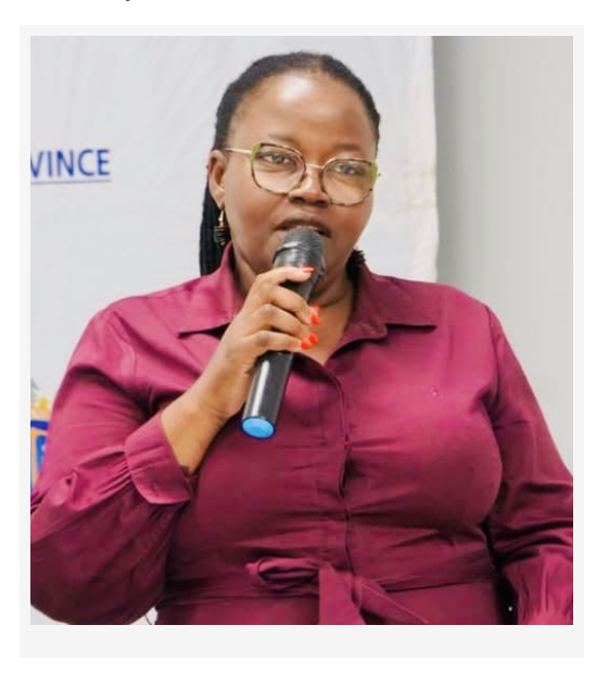 Gauteng government official speaks into a microphone during a public transport and regulatory engagement.