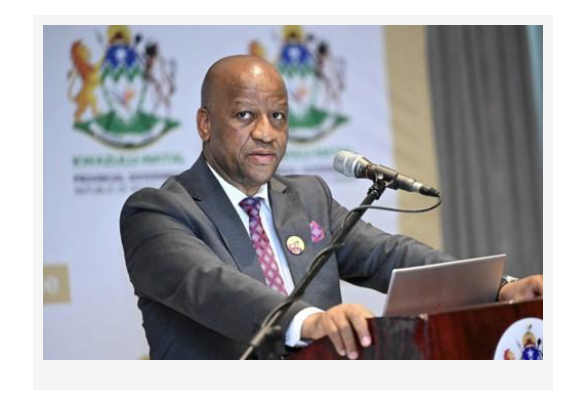 KwaZulu-Natal Premier Thamsanqa Ntuli addresses an audience from a podium during an official provincial government event.