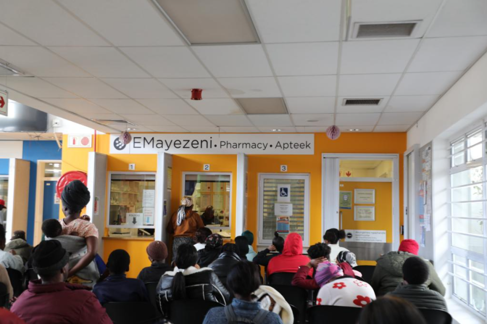 Patients waiting at a public healthcare pharmacy to collect medication in the Western Cape.