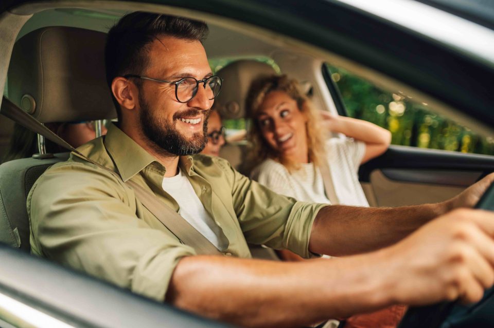 Family travelling by car as South Africans prepare for December road trips amid rising fuel and transport costs.