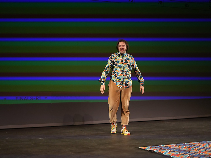 Swiss spoken-word artist Valerio Moser performs on stage during the World Poetry Slam Championship in Durban.